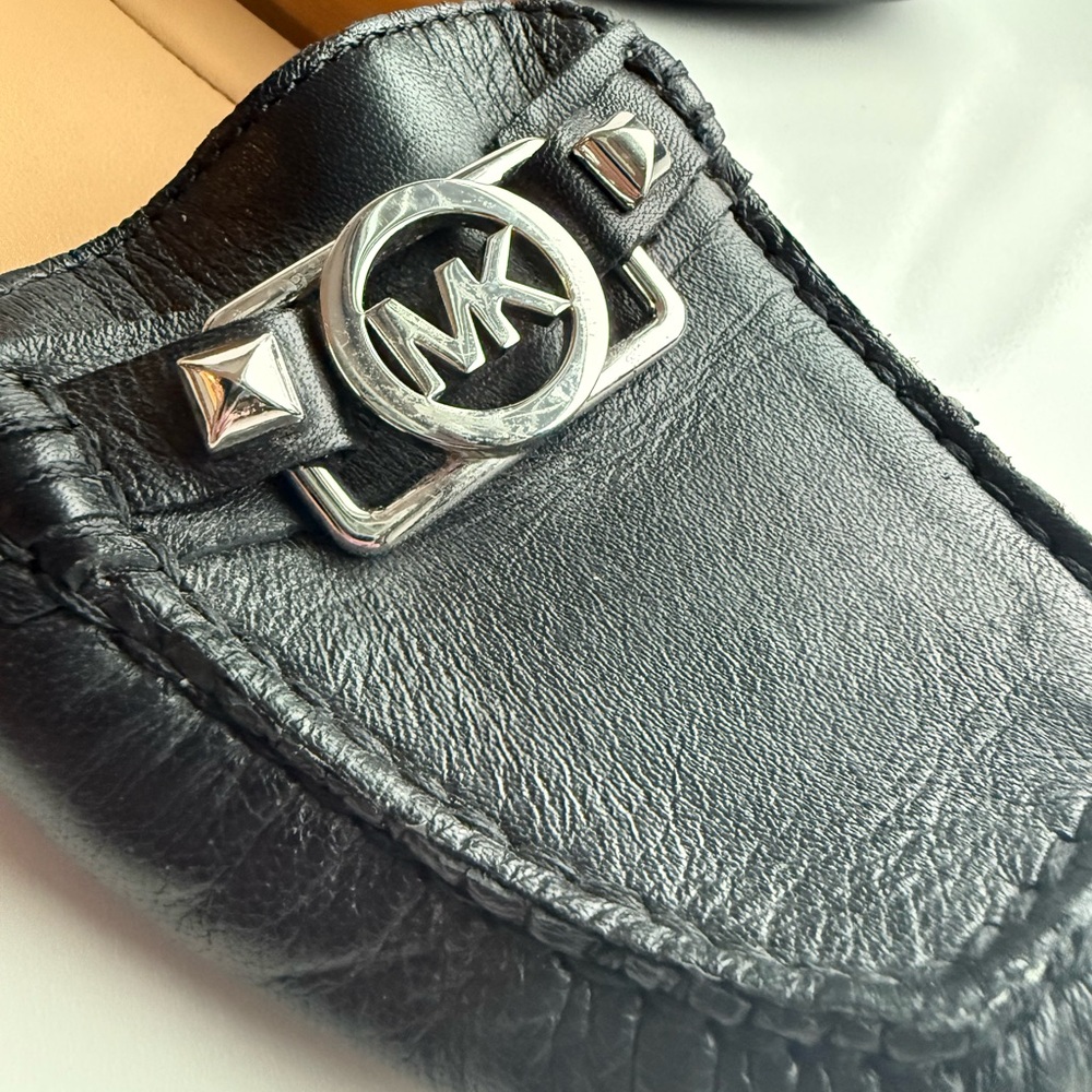 Michael Kors Black Leather Slip-Ons with Silver Detail